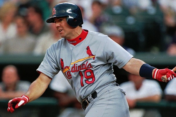 St. Louis Cardinals' Tom Pagnozzi hits a ground ball to Colorado Rockies third baseman Vinny Castilla in the second inning in Denver's Coors Field on Friday, May 17, 1996. (AP Photo/David Zalubowski)