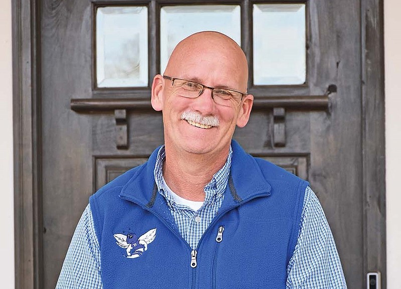 Bryant Mayor Allen Scott stands outside his home in this 2018 file photo. Scott had just been elected mayor at the time of the photo after serving since 2003 as a teacher for the Bryant School District.