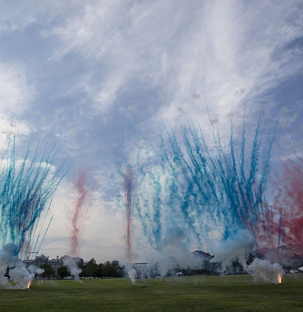 The White House (center) is obscured Saturday by red and blue smoke from fireworks on the Ellipse during a “Salute to America” event in Washington. More photos at arkansasonline.com/75july4/. (AP/Alex Brandon)