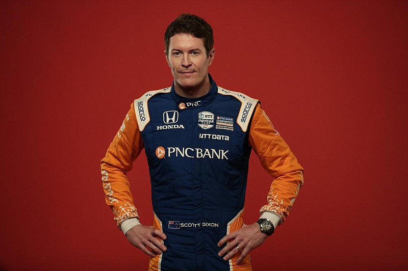 IndyCar driver Scott Dixon poses for photos during IndyCar Media Day Auto Racing, Monday, Feb. 10, 2020, in Austin, Texas. (AP Photo/Eric Gay)