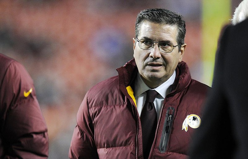 FILE - In this Dec. 1, 2013, file photo, Washington Redskins owner Dan Snyder walks off the field before an NFL football game against the New York Giants in Landover, Md. Washington Redskins owner Dan Snyder said Tuesday, April 22, 2014, it's time for people to "focus on reality" concerning Native American matters instead of criticizing the team's nickname. Challenged by those who consider the name "Redskins" offensive, Snyder and his staff recently traveled to Native American reservations and last month established a foundation to assist American Indian tribes. (AP Photo/Nick Wass, File)