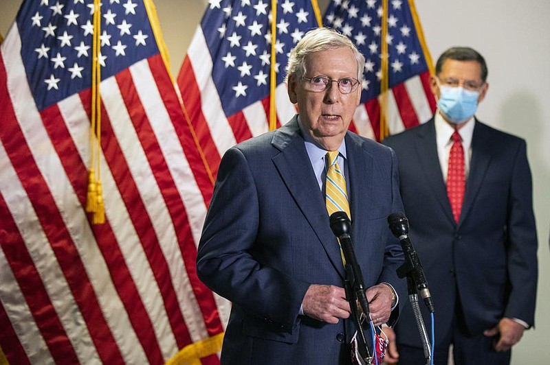 Senate Majority Leader Mitch McConnell, shown while talking to reporters last week, said Monday that he plans to release a new bill as the starting point for talks on a coronavirus relief package. (AP/Manuel Balce Ceneta) 