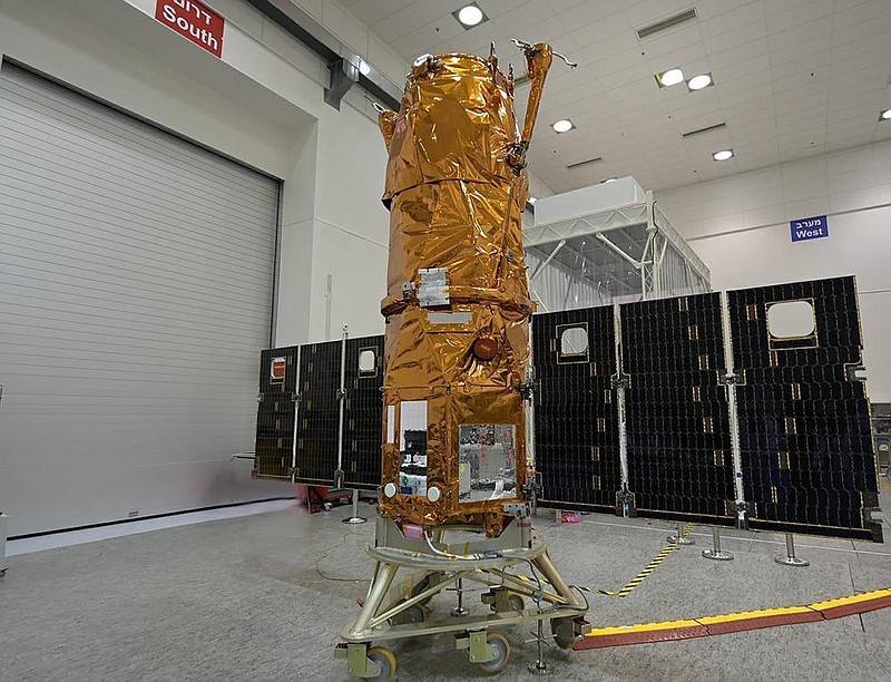 The Ofek 16 satellite sits on display at an Israel Aerospace In- dustries facility shortly before launch Monday. (AP/Israeli Ministry of Defense Spokesperson’s Office) 