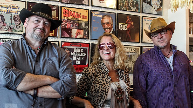Guitarist-vocalist Buddy Case (left), with Laura Lynn Danley and Justin Patterson of country-folk duo Ten Penny Gypsy, is featured on “Fugitive Heart,” Ten Penny Gypsy's new album, which will be released Friday.

(Special to the Democrat-Gazette)