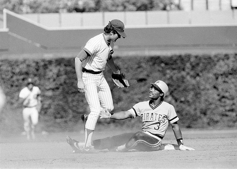 Johnny Ray, shown here with Ryne Sandberg of the Chicago Cubs in 1984, said having a locker next to Hall of Famer Willie Stargell paid dividends for him in his career. (AP file photo) 
