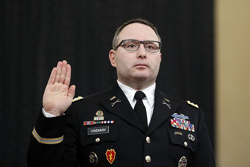 In this Nov. 19, 2019, file photo National Security Council aide Lt. Col. Alexander Vindman is sworn in to testify before the House Intelligence Committee on Capitol Hill in Washington.
(AP Photo/Andrew Harnik, File)