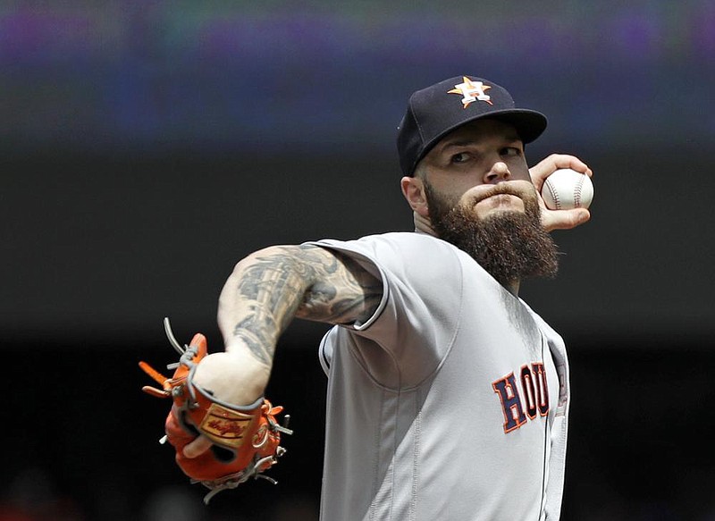 Former Arkansas pitcher Dallas Keuchel spent the first seven seasons of his major-league career with the Houston Astros, winning the American League Cy Young Award in 2015 and helping lead them to a World Series title in 2017.
(AP file photo)
