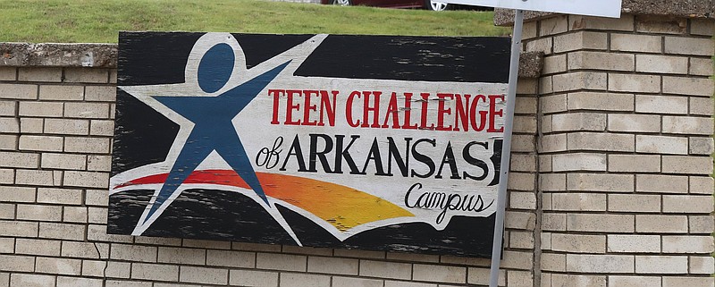 The sign at the main entrance to the campus of Adult and Teen Challenge. - File photo by The Sentinel-Record