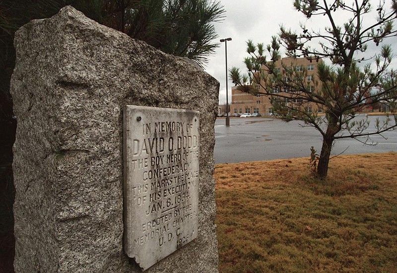 This historical marker on the University of Arkansas at Little Rock William H. Bowen School of Law campus, shown Jan. 2, 1999, remembered David O. Dodd, who was executed Jan. 8, 1864. The monument was removed last month by the city.
(Arkansas Democrat-Gazette/Staton Breidenthal)