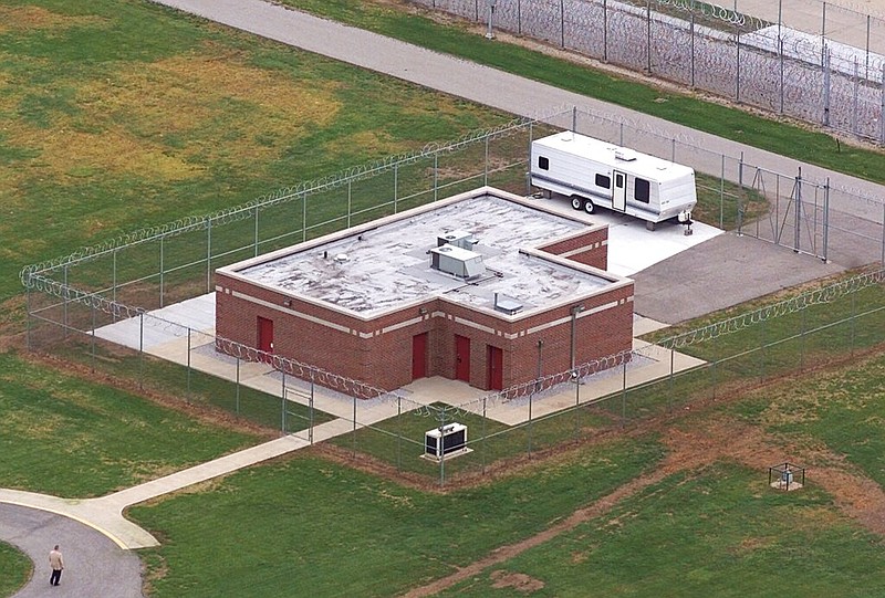 The execution facility at the United States Penitentiary in Terre Haute, Ind., is shown in this June 11, 2001, aerial file photo. President Donald Trump's administration wants to restart federal executions this month at the Terre Haute prison after a 17-year hiatus, starting with Daniel Lee, convicted in Arkansas of the 1996 killings of gun dealer William Mueller; his wife, Nancy; and her 8-year-old daughter, Sarah Powell.