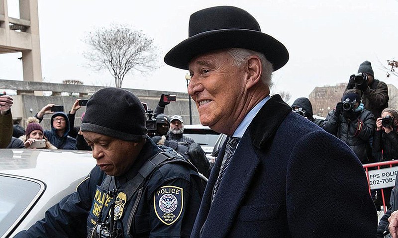 Roger Stone leaves federal court Feb. 20 in Washington after he was sentenced to more than three years in federal prison. In a statement Friday announcing commutation of his sentence, the White House said that “Roger Stone has already suffered greatly.”
(AP/Alex Brandon)
