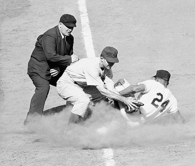 Former Chicago Cubs third baseman Randy Jackson, shown here putting a tag on Willie Mays of the New York Giants during a 1954 game, is on an impressive list of players who were affiliated with the University of Arkansas, but never played for the Razorbacks.
(AP file photo)