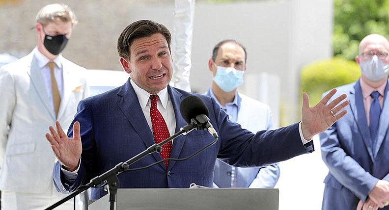 Florida Gov. Ron DeSantis gives an update on the state’s response to the coronavirus pandemic Friday at Florida’s Turnpike Turkey Lake Service Plaza in Orlando.
(AP/Orlando Sentinel/Joe Burbank)