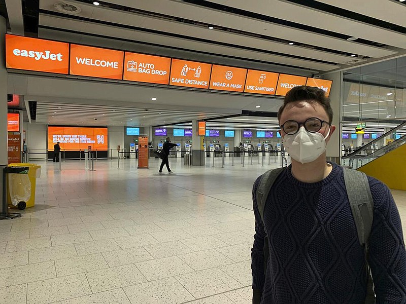 Edinburgh University student Eoin Burgin, 21, waits Friday at London’s Gatwick Airport before flying to Basel, Switzerland, where he was to reunite with his girlfriend after a five-month separation. More photos are available at arkansasonline.com/711uk/
(AP/Tom Pilgrim)