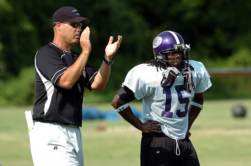 Ouachita Baptist Coach Todd Knight (left) said he expects to have about 80% of his team present for workouts on Monday. He said he hasn’t had a chance to gauge what type of shape his team is in since spring workouts were sus- pended because of the coronavirus pandemic. 
(Arkansas Democrat-Gazette file photo) 