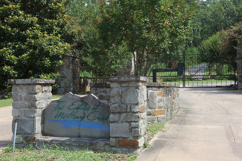 5208 McHenry Creek Circle -- Owned by Kelly and Matthew L. White, a house behind this gate was sold to Jennifer E. and Nolan R. Bruce for $620,000.