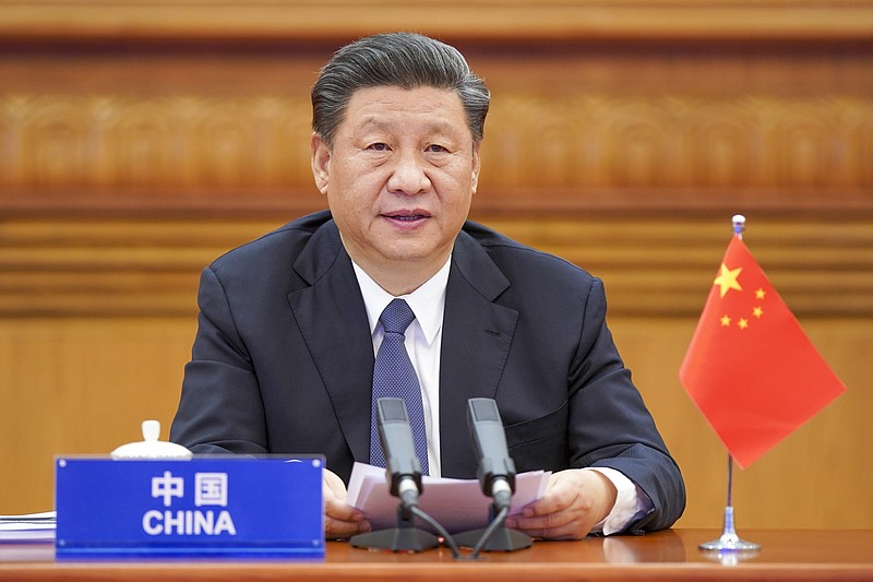 FILE -- In this photo released by Xinhua News Agency, Chinese President Xi Jinping attends the G20 Extraordinary Virtual Leaders' Summit on covid-19 via video link in Beijing, capital of China, March 26, 2020.