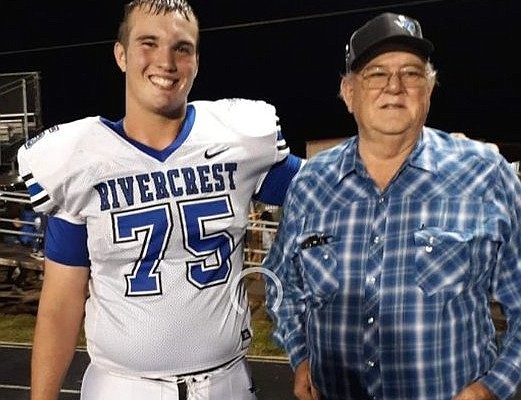Arkansas O-line commitment Cole Carson and his grandfather Sonny Belcher.
