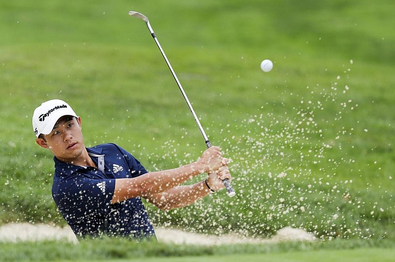 Collin Morikawa hits from a bunker on the seventh hole during the final round of the Workday Charity Open golf tournament, Sunday, July 12, 2020, in Dublin, Ohio. (AP Photo/Darron Cummings)