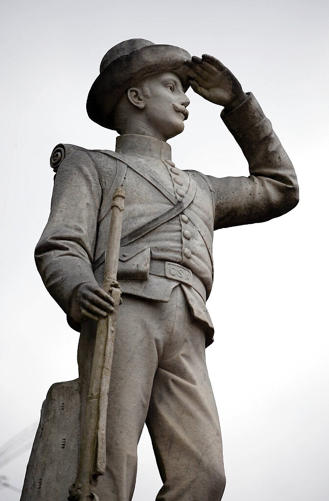 FILE - In this Feb. 23, 2019 file photo a Confederate soldier monument stands at the University of Mississippi in Oxford, Miss. The monument will be moved from the prominent spot at the university to a Civil War cemetery in a secluded part of the Oxford campus. (AP Photo/Rogelio V. Solis, File)