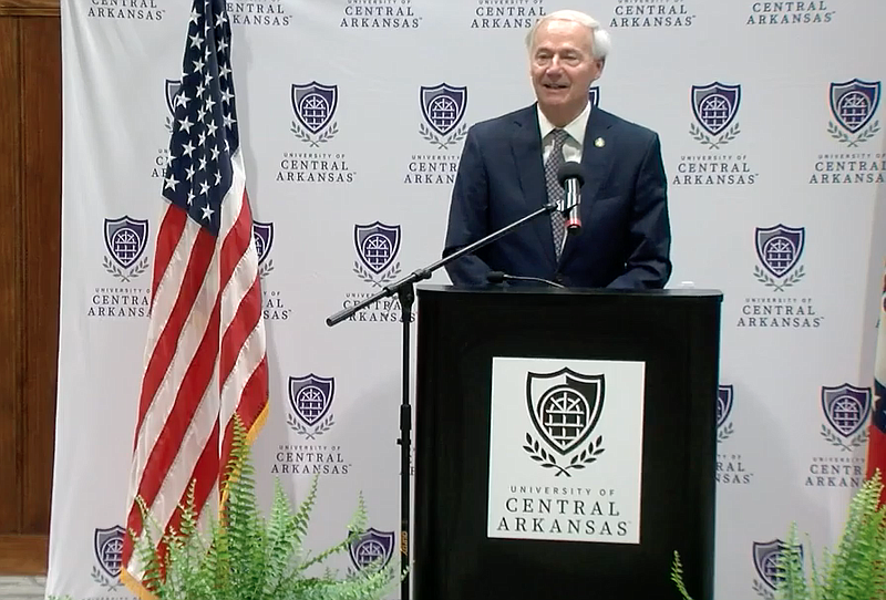 Arkansas Gov. Asa Hutchinson speaks to reporters in Conway on Wednesday in this still of video provided by the governor's office. 

