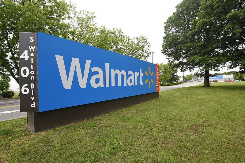 FILE -- The entrance to the Bentonville Walmart is seen on Tuesday May 19, 2020 along South Walton Boulevard. (NWA Democrat-Gazette/Flip Putthoff)