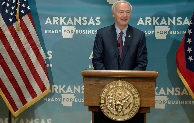 Arkansas Gov. Asa Hutchinson speaks to reporters at the state Capitol in Little Rock on Thursday in this still of video provided by the governor's office. 
