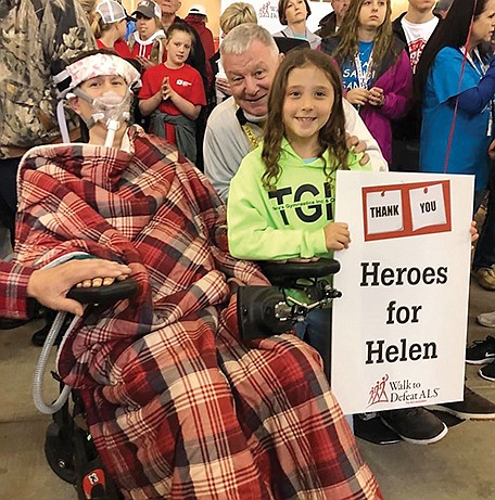 Helen McCombs, left, of Russellville, and her daughter, Emma, pose for a photo with Tommy May, former president of Simmons Bank, during the 2019 ALS Walk for Life. From 10-11 a.m. Saturday, members of the Heroes for Helen Facebook group will lead a drive-by parade in front of McCombs’ house to help raise money for support services and awareness of amyotrophic lateral sclerosis.