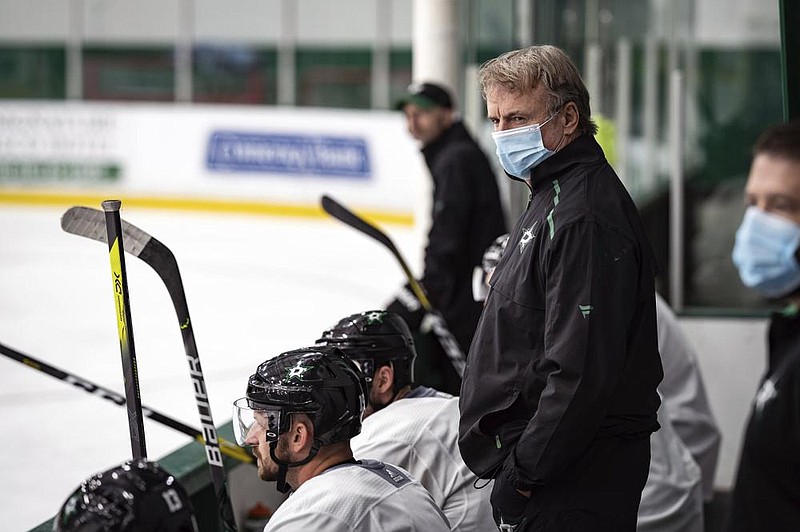 Dallas Stars interim head coach Rick Bowness watches practice Tuesday in Frisco, Texas. Bowness, 65, coached from behind the bench the first couple of days of training camp before lacing up his skates and getting on the ice. Montreal’s Claude Julien, 60, Edmonton’s Dave Tippett, 58, and others are confident in the NHL’s protocols as older, more at-risk people deal with the coronavirus pandemic.
(AP/Dallas Stars/Jeff Toates)