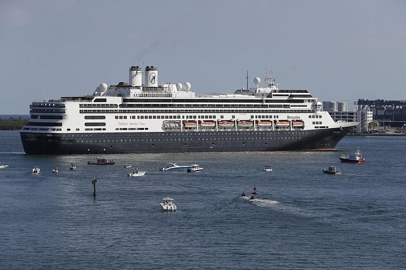 The cruise ship Rotterdam heads into dock at Port Everglades in Fort Lauderdale, Fla., in April. The Rotterdam is among the ships operator Holland America is selling as the cruise industry tries to survive the pandemic.
(AP)