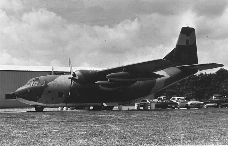 A C-123K cargo plane, like this one, was out tted at the Mena airport and “ ew with various cameras ... to obtain photographic evi- dence of the Sandinistas in the act of smuggling narcotics,” according to an entry in the Encyclopedia of Arkansas (Arkansas Democrat-Gazette file photo) 