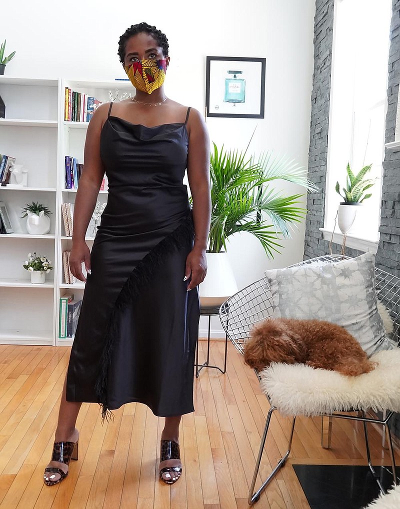 Ronne Brown shows off her Hanifa dress in an undated handout image. Fashion purchases innocently made before the spread of coronavirus are poignant markers of canceled activities. (via The New York Times) 
