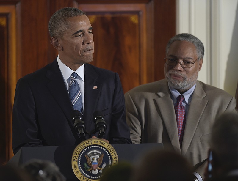 Lonnie G. Bunch III (right) and former President Barack Obama attend a September 2016 reception for the opening of the Smithsonian Museum of African American History and Culture. Bunch will deliver a virtual lecture Aug. 6 on behalf of the Clinton Foundation and the Clinton School of Public Service.

(AP file photo/Susan Walsh)