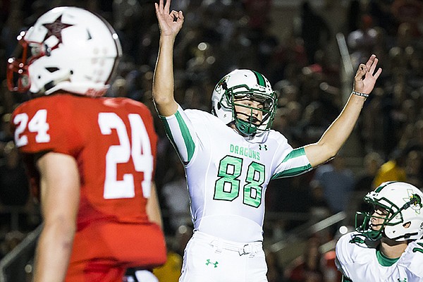 Southlake Carroll kicker Kole Ramage (88) celebrates after kicking a 28-yard field goal with 12 seconds left during the fourth quarter to force overtime in a high school football game against Coppell at Buddy Echols Field on Friday, Oct. 2, 2015, in Coppell, Texas. (Smiley N. Pool/The Dallas Morning News)
