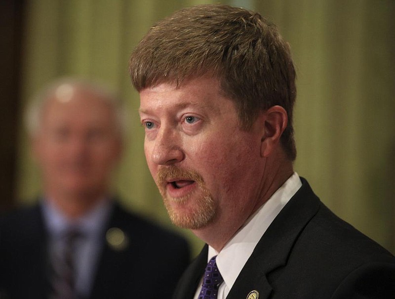 State Education Secretary Johnny Key, right, along with Gov. Asa Hutchinson speaks Tuesday July 16, 2020 at the state Capitol in Little Rock during his daily covid-19 briefing. See more photos at arkansasonline.com/722governor/. (Arkansas Democrat-Gazette/Staton Breidenthal)