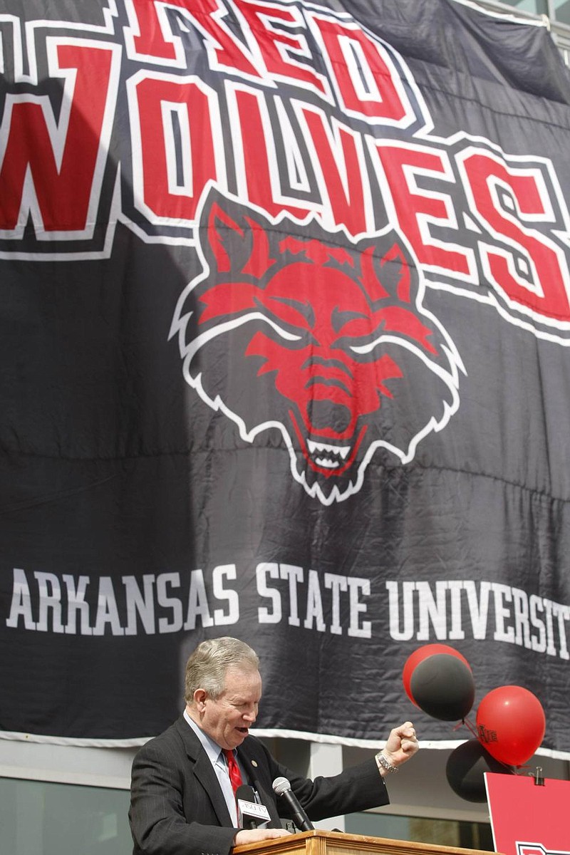 A banner displaying Arkansas State University’s “Red Wolves” logo is shown during the school’s announcement of the nickname in 2008. The nickname is reportedly being considered by Washington’s NFL team, but the franchise has not reached out to the school regarding use of the nickname. 
(Democrat-Gazette file photo) 