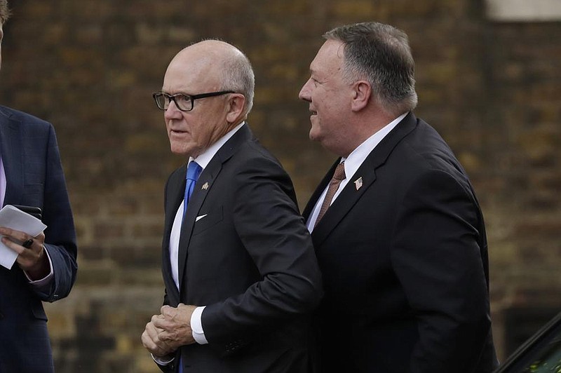 Robert “Woody” Johnson (left), U.S. ambassador to Britain, and U.S. Secretary of State Mike Pompeo walk earlier this week to No. 10 Downing St. in London for a meeting with British Prime Minister Boris Johnson.
(AP/Matt Dunham)