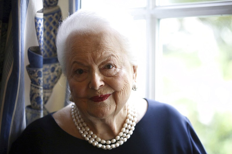 Actress Olivia de Havilland poses during an Associated Press interview in Paris in this June 18, 2016, file photo. De Havilland has died in Paris, her publicist said Sunday, July 26, 2020. She was 104.