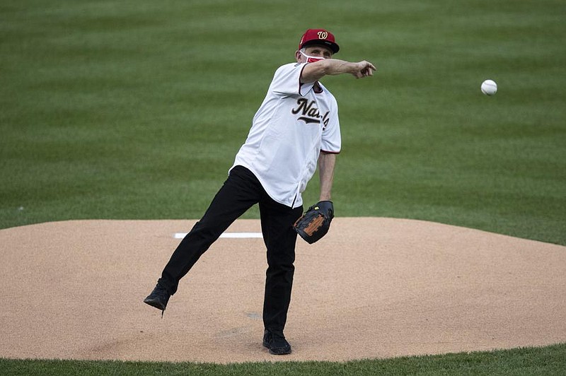 Dr. Anthony Fauci, director of the National Institute of Allergy and Infectious Diseases, threw out the ceremonial first pitch before the Washington Nationals’ home opener against the New York Yankees on Thursday. Fauci’s pitch came up short and to the left of home plate.
(AP/Alex Brandon)