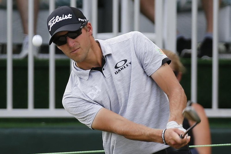 Richy Werenski chips up to the 17th green during the third round of A Military Tribute at The Greenbrier golf tournament in White Sulphur Springs, W.Va., Saturday, Sept. 14, 2019. (AP Photo/Steve Helber) story.lead_photo.caption