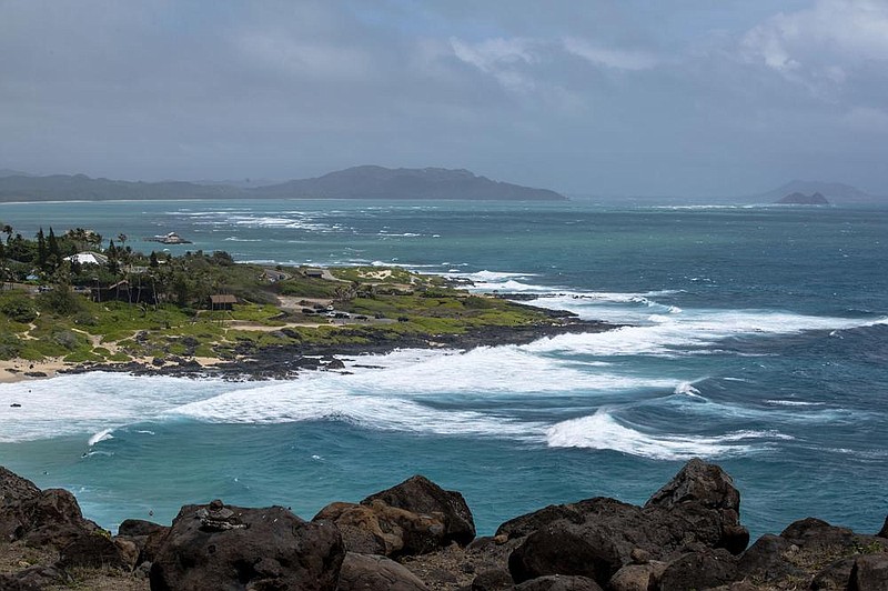 High surf breaks on Oahu’s Windward coast Sunday as seen from Honolulu’s Makapuu Lookout. (AP/Eugene Tanner) 