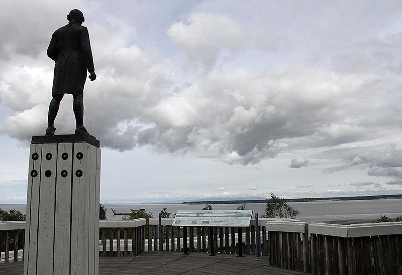 The Captain James Cook statue faces the inlet that bears his name and fronts downtown in Anchorage, Alaska’s largest city. Alaska residents are looking to eliminate statues of colonialists accused of abusing and exploiting indigenous people. More photos at arkansasonline.com/727alaska/.(AP Photo/Mark Thiessen)