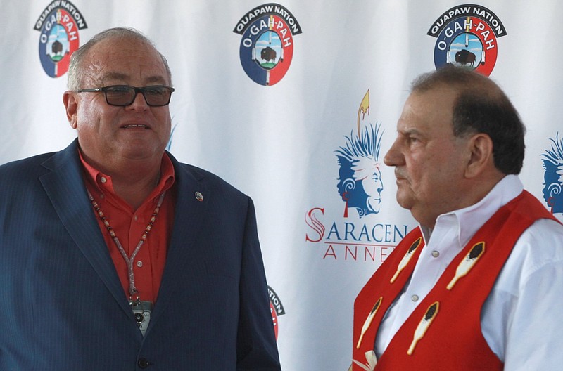 John L. Berrey (left), then chairman of the Quapaw Nation's governing body, talks with Osage Nation member Steve Pratt before the grand opening ceremony of the Saracen Casino Annex in Pine Bluff in this Oct. 1, 2019, file photo. Berrey, a 20-year chairman of the Quapaw Nation, was unseated in his reelection bid on Saturday, July 25, 2020, by Joseph Tali Byrd, 35.

CORRECTION: An earlier version of this photo caption incorrectly listed Steve Pratt's affiliation. He is a member of the Osage Nation.
