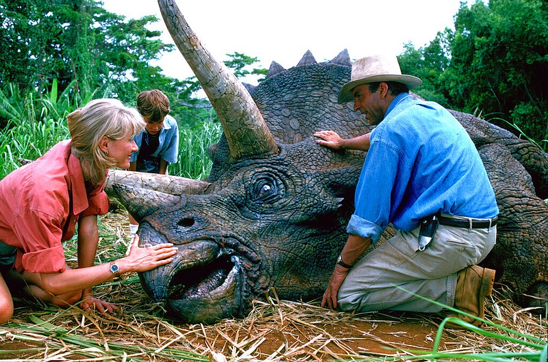 Laura Dern (from left), Joseph Mazzello and Sam Neill appear in a scene from the 1993 film "Jurassic Park." The film has been the highest-grossing movie of the summer of 2020 with a bit more than $3 million in ticket sales, according to several people who have seen box-office grosses.