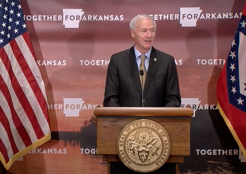 Arkansas Gov. Asa Hutchinson speaks to reporters at the state Capitol in Little Rock on Thursday in this still of video provided by the governor's office. 
