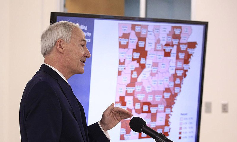 Gov. Asa Hutchinson, holding his briefing Wednesday at Arkansas Tech University in Russellville, was noncommittal about opening public schools. “You probably should ask me that question maybe a week out,” he said. More photos at arkansasonline.com/730governor/.
(Arkansas Democrat-Gazette/Staton Breidenthal)