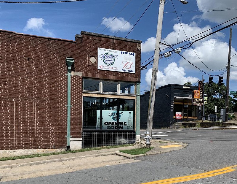 FILE - “Coming soon” signs are in the windows of The Oyster Bar on West Markham Street in Little Rock.
(Arkansas Democrat-Gazette/Eric E. Harrison)