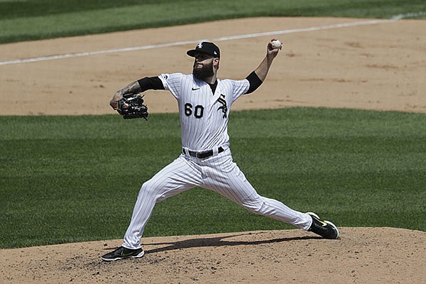 Chicago White Sox starting pitcher Dallas Keuchel throws the ball against the Minnesota Twins during the fifth inning of a baseball game in Chicago, Saturday, July 25, 2020. (AP Photo/Nam Y. Huh)