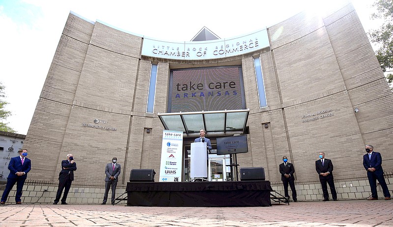 Dr. Cam Patterson, UAMS Chancellor, speaks Tuesday June 23, 2020 at the kickoff event for the Take Care Arkansas campaign at the Little Rock Regional Chamber of Commerce. (Arkansas Democrat-Gazette/Staton Breidenthal)	