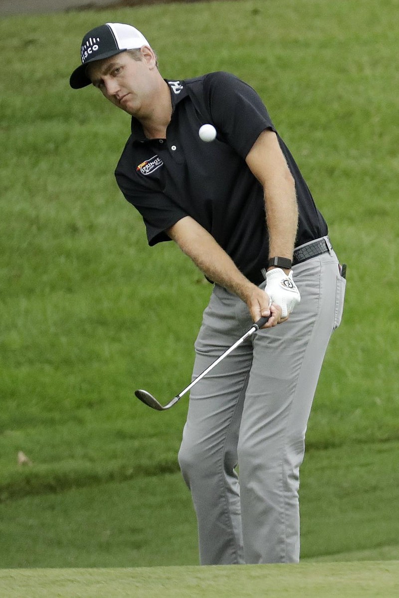 Brendon Todd shot a third-round 69 and leads the St. Jude In- vitational by one stroke over Byeong Hun An. More photos at arkansasonline.com/82invitational. (AP/Mark Humphrey) 